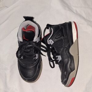 Jordan 4 Kids Black and Red .